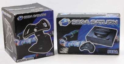 A Sega Saturn PAL boxed electronic console (model No. 1) housed in the original card box