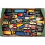 A tray containing a quantity of play-worn Dinky Toys diecasts with examples including No. 40D Austin