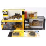 6 various boxed and carded mixed scale construction and earth moving diecast models, to include