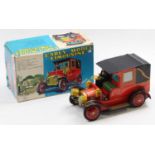 An Alps Toys of Japan tinplate battery-powered Early Model Limousine comprising a red body, with