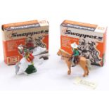 A Britains Swoppets boxed cowboy figure group to include No. 638 Cowboy resting, mounted, and one