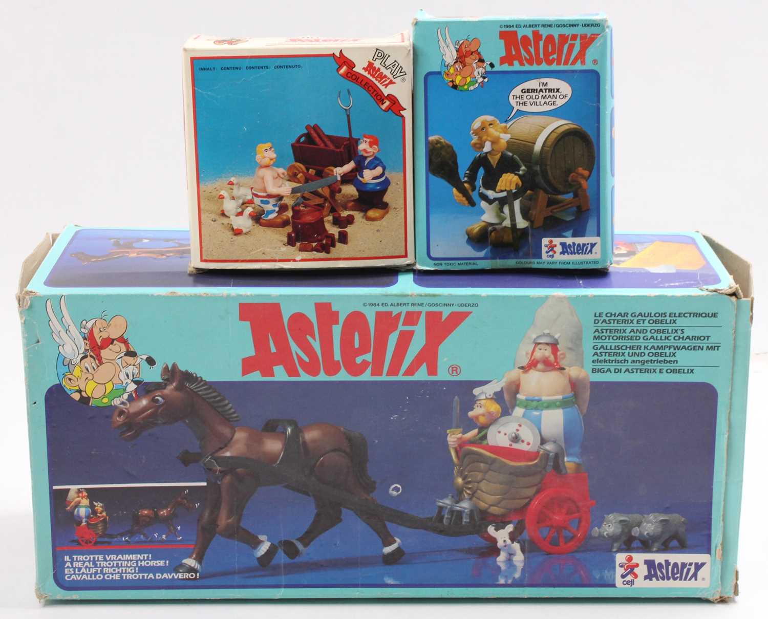 A collection of 3 boxed CEJI Asterix models comprising No. 006251 Cesar and Cleopatra's motorised