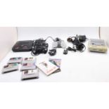 Vintage Super Nintendo Game Console with power leads and a collection of games to include Fifa 97,