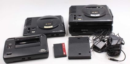 A collection of Sega related loose consoles to include a Sega Mega Drive with Mega-CD extra, a