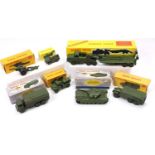 A collection of Dinky Toys military vehicles including No. 660 Tank Transporter, No. 622 10-Ton Army