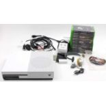 Two boxes containing a collection of Xbox 1 and Xbox 360 video games, consoles, controllers and