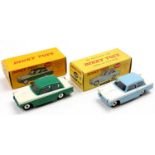 2 Dinky Toys No. 189 Triumph Herald, with the first comprising a pale blue and white body, spun