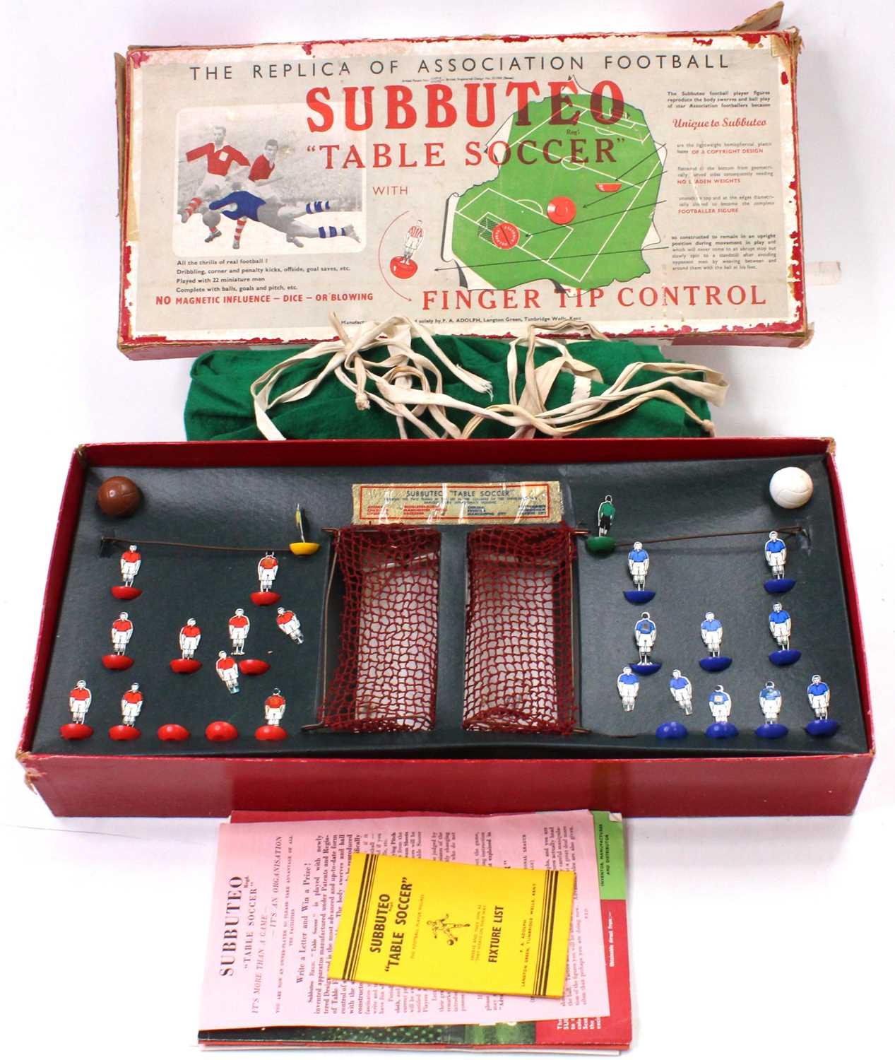 A Subbuteo Table Soccer set from the 1950's comprising 2 teams of 'flats' one in blue, and one in