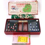 A Subbuteo Table Soccer set from the 1950's comprising 2 teams of 'flats' one in blue, and one in