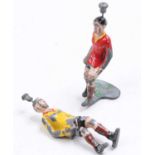 Russel Manufacturing or similar lead hollowcast football figure group, 2 example, with working leg/