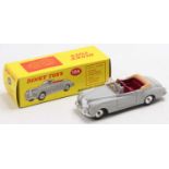 Dinky Toys No. 194 Bentley Coupe comprising of grey body, maroon interior, with a brown tonneau, and