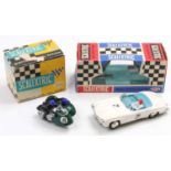A boxed Scalextric slot car group to include a No. C/75 Mercedes Benz race car comprising of white