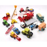 A collection of Britains Farm models and accessories including a No. 9523 Ford 7710 Tractor, No.