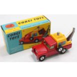 Corgi Toys 477 Landrover breakdown truck comprising red body, lemon interior, and plastic yellow