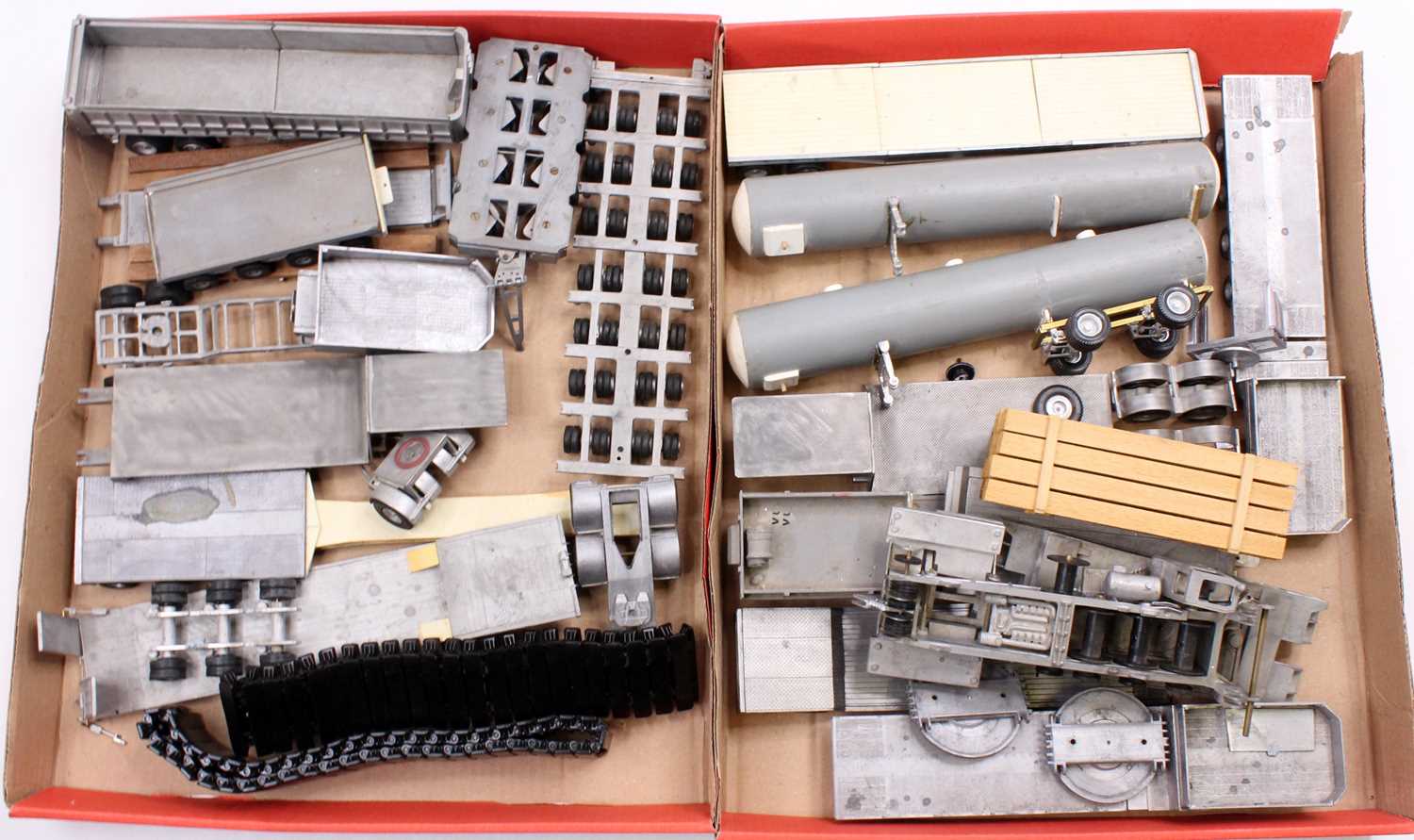 Two trays containing a large collection of various white metal 1/48 and 1/50 scale commercial