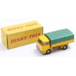French Dinky No.584 Berliet Covered Wagon comprising yellow cab and back, brown chassis, cream