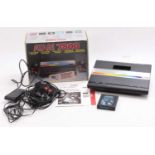 An Atari 7800 boxed video game system/console, housed in the original card box comprising of