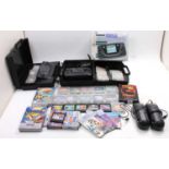 A collection of Sega Game Gear, hand-held video game consoles, together with a large collection of