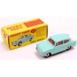 Dinky Toys No. 155 Ford Anglia comprising turquoise body with red interior, and spun hubs, the model