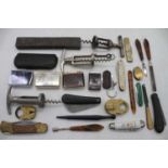 A collection of miscellaneous items to include an early 20th century steel barrel corkscrew,