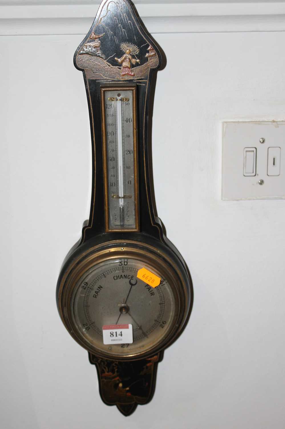 An early 20th century chinoiserie black lacquer wall barometer, height 47cm