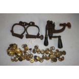 A collection of miscellaneous items, to include a cast iron cartridge loader, pair fo iron