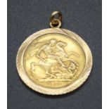 A jeweller's copy of a sovereign in yellow metal mount, unmarked but mount tests as approx 18ct, 7g,