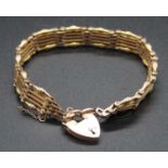 A 9ct gold gatelink bracelet, 19.4gStamped 9ct and tested as 9ct.Length 18.5cm.Safety chain is