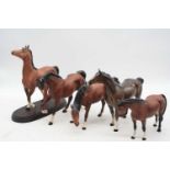 A Beswick model of a horse 'Spirit of Freedom', No.2689, matt, h.19cm; together with four various