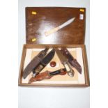 A box of assorted pocket and sheath knives