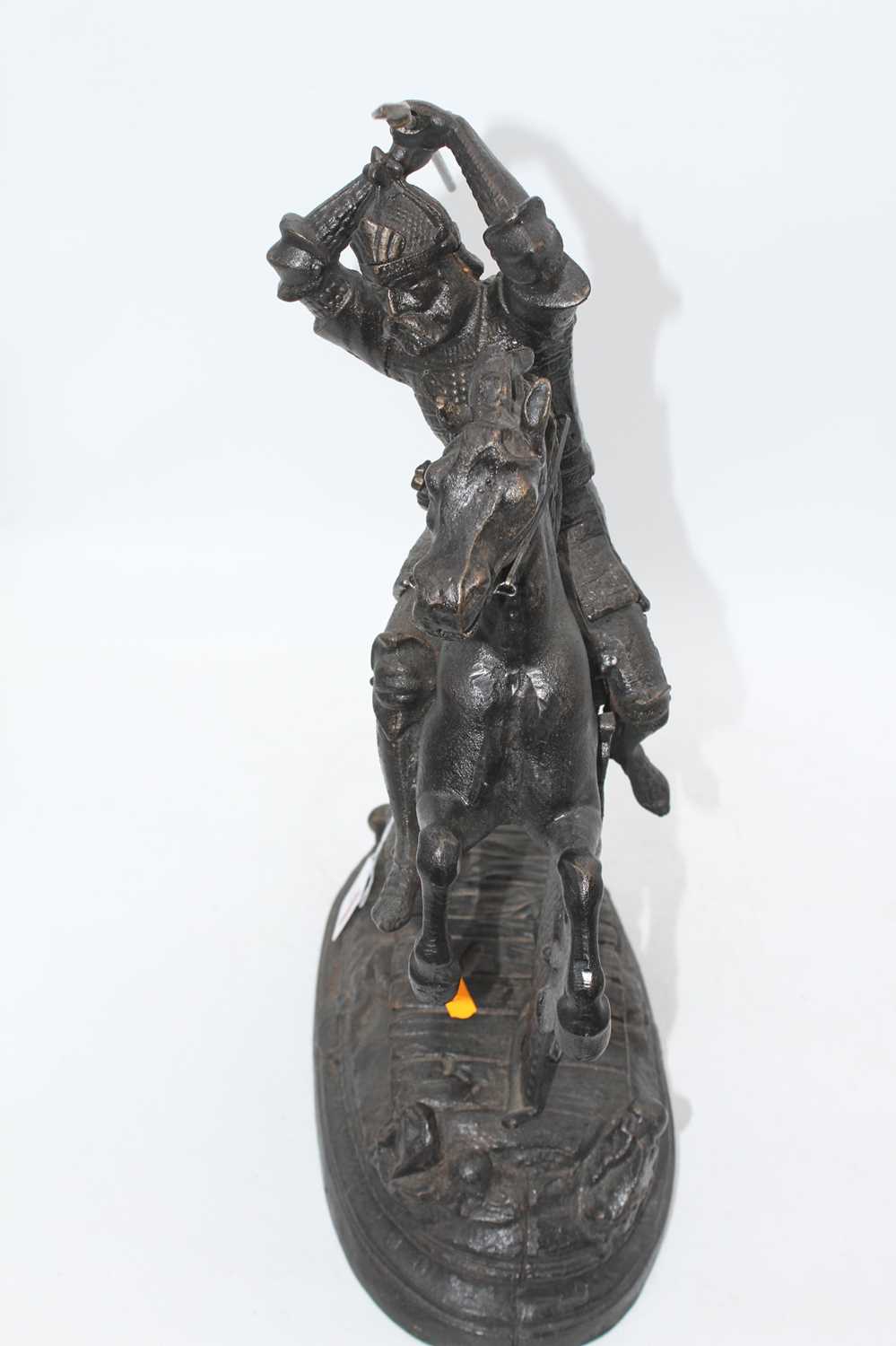 A reproduction cast iron figure of a soldier on horseback, shown carrying a spear, height 51cm - Image 4 of 4