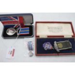 A National Service medal with miniature in box with certificate No. 80777, together with a Royal