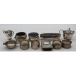 A collection of miscellaneous silver items to include a George V cut glass silver and