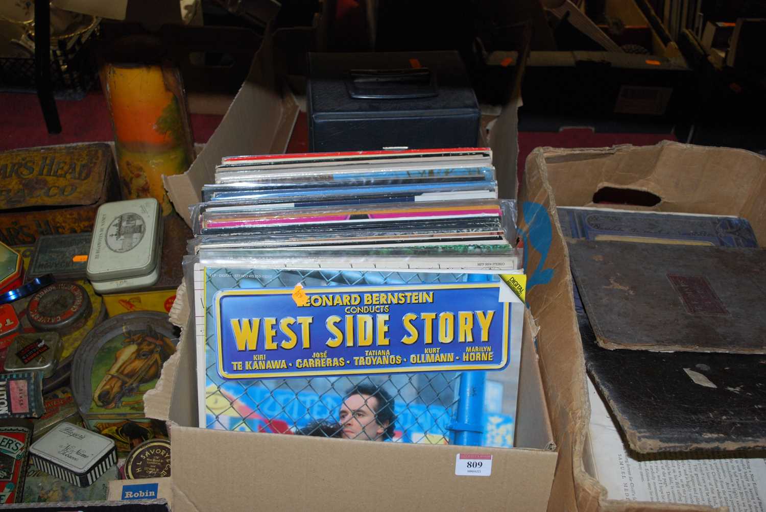 A collection of various records to include The West Side Story Soundtrack, The Best of George Jones,