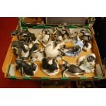 A collection of Franklin Mint porcelain penguin figures