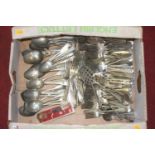 A collection of mixed plated flatware