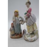A German porcelain figure of a lady in 18th century dress, h.24.5cm; together with another figure