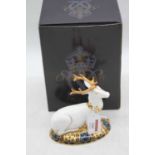 A Royal Crown Derby model of a white hart, h.14cm, boxedIn good order.Gold stopper.