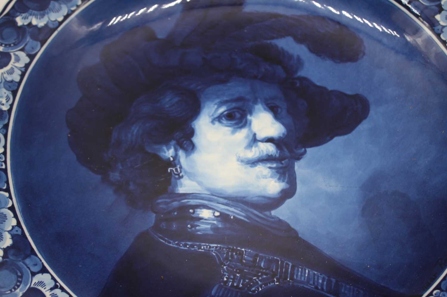 A Delft pottery charger, decorated with a Renaissance style bust of a gentleman, dia. 42cm - Image 2 of 3