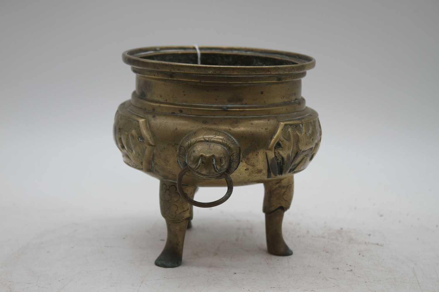 A Chinese brass tripod censer, flanked by zoomorphic handles, zhuanshu seal mark to the underside, - Image 2 of 2