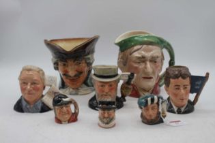 A collection of Royal Doulton character jugs, to include Michael Doulton and The Figure Collector,