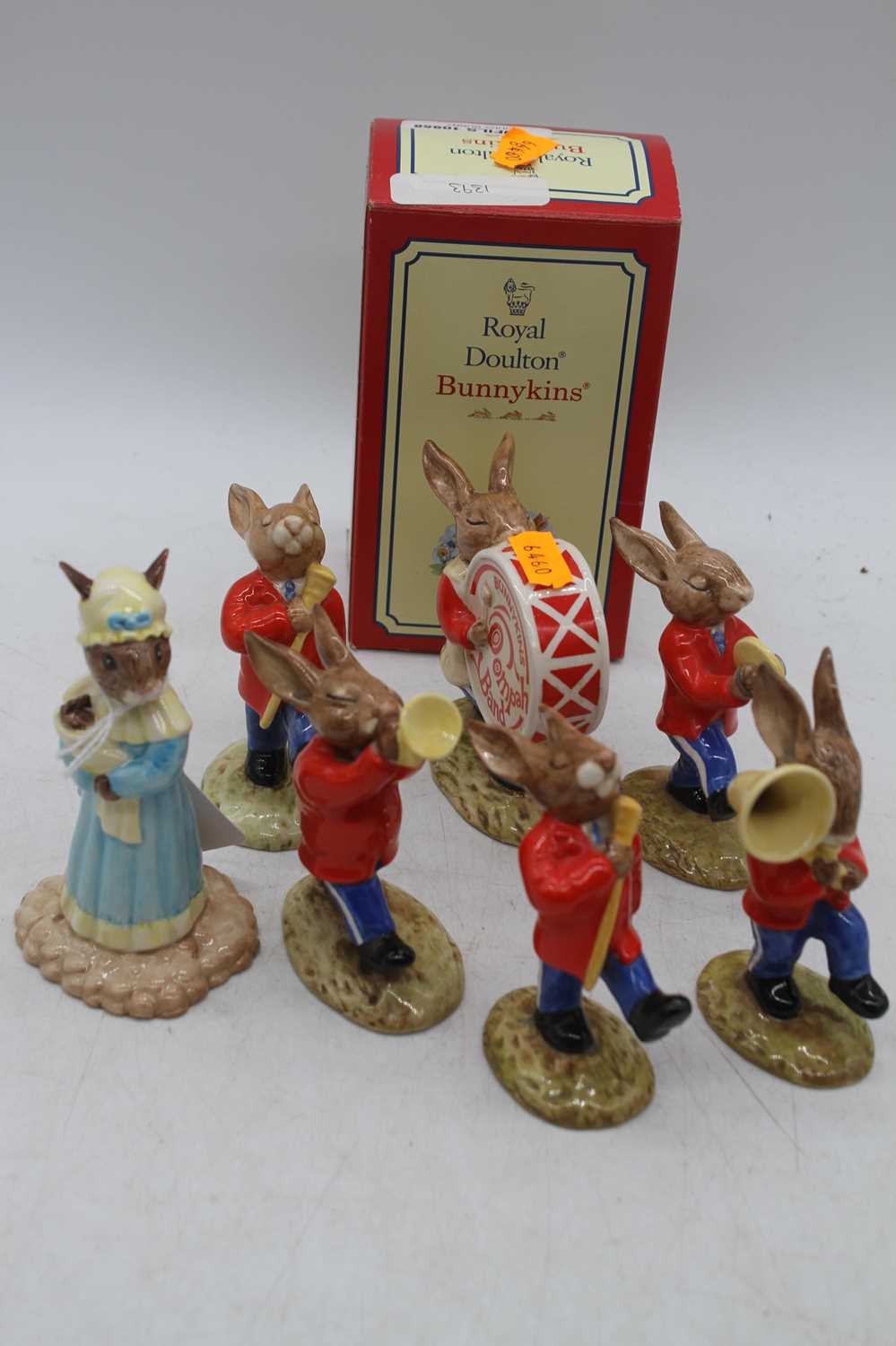 A collection of Royal Doulton Bunnikins band figures; together with a further Royal Doulton