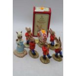 A collection of Royal Doulton Bunnikins band figures; together with a further Royal Doulton