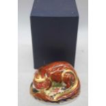 A Royal Crown Derby model of an otter, h.6.5cm, boxed A second.
