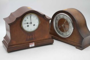 An Edwardian mahogany cased eight day mantel clock, the enamel dial showing Arabic numerals,