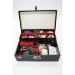 A jewellery box and contents to include engine turned silver ladies powder compact, enamelled