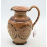 A Doulton Lambeth stoneware jug, decorated with applied mask roundels, h.19cm