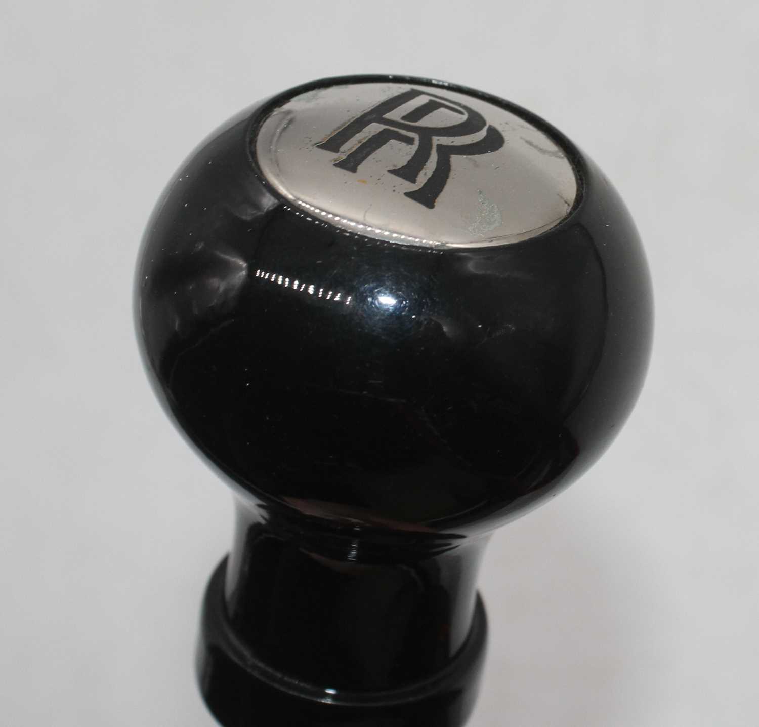 A reproduction walking stick, the handle inset with a Rolls Royce badge, 93cm