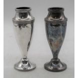 A pair of Edward VII silver vases, Birmingham 1905, h.17cm (loaded)