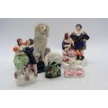 A collection of 19th century Staffordshire groups, to include spaniels, h.19cm